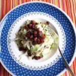 Pointed cabbage salad with smoked almonds and bacon dressing